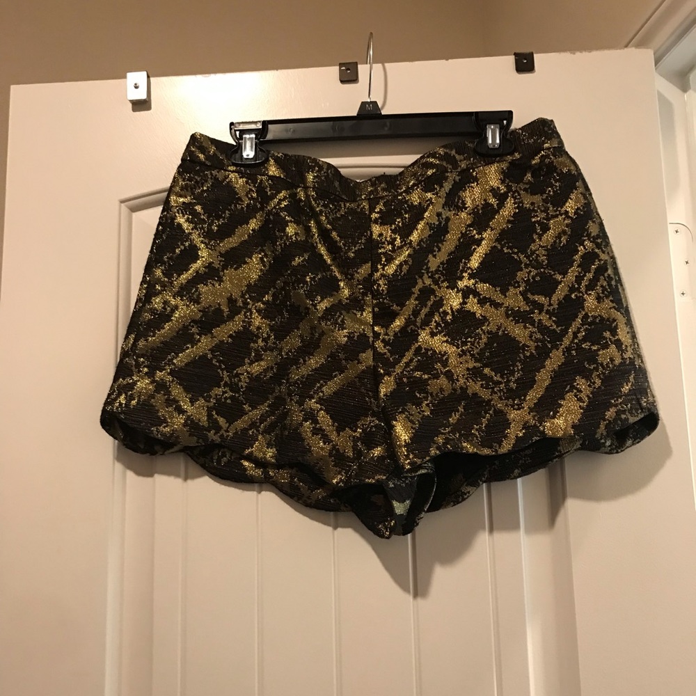Black and gold scalloped hemline shorts